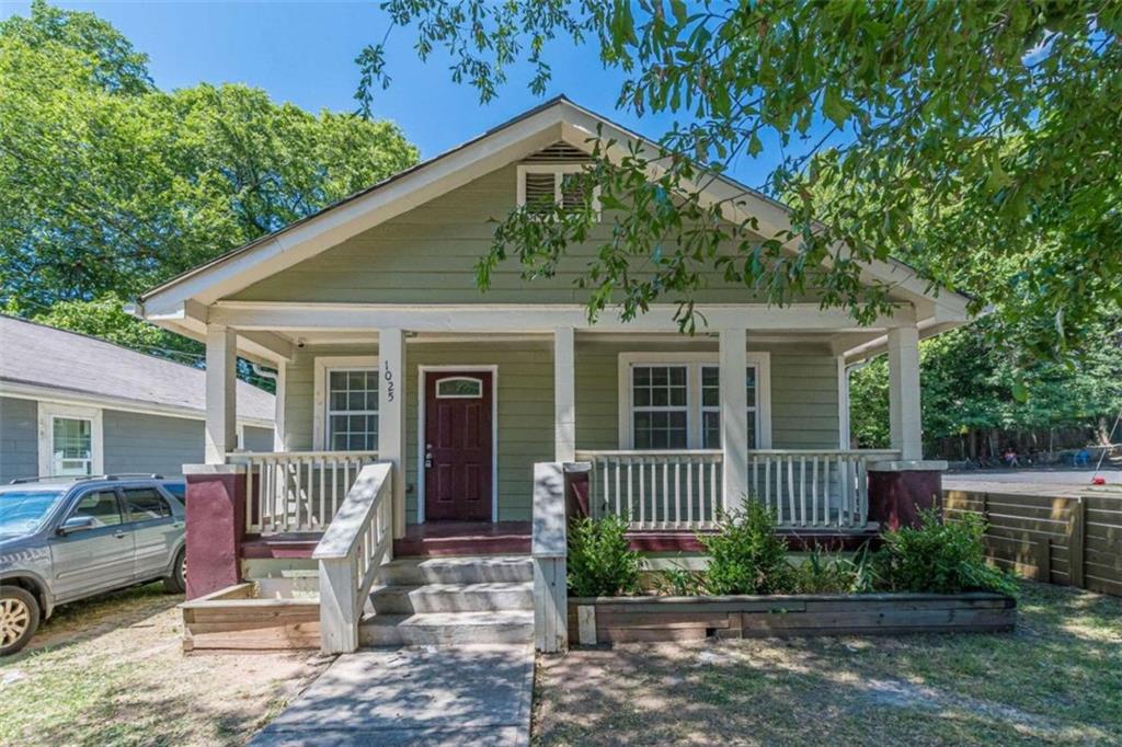 a front view of a house with a porch