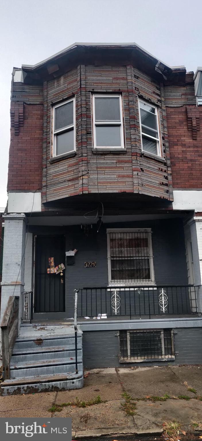 a front view of a house with windows