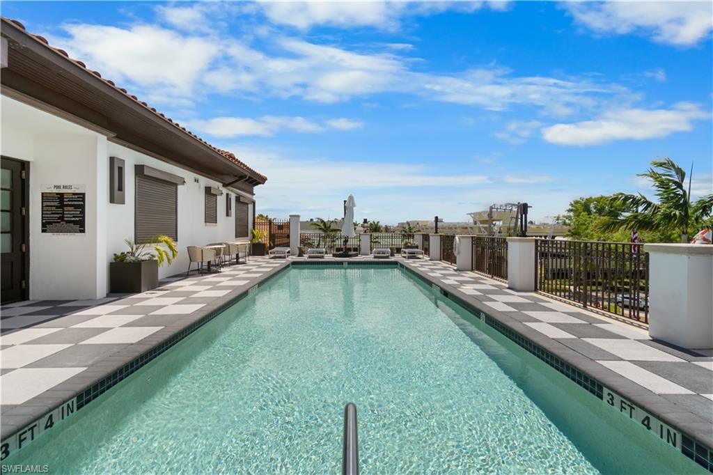 a view of a house with swimming pool