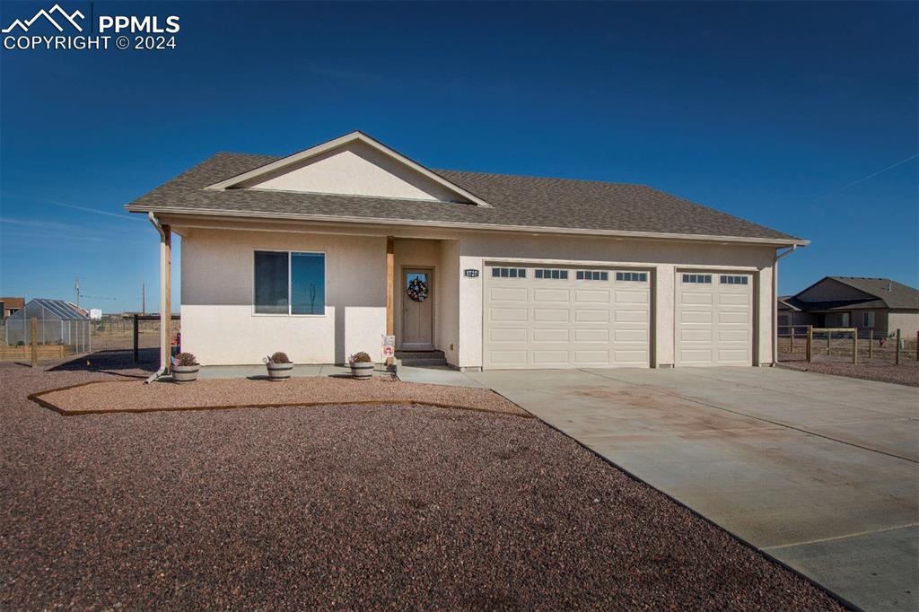 View of front of home with a garage