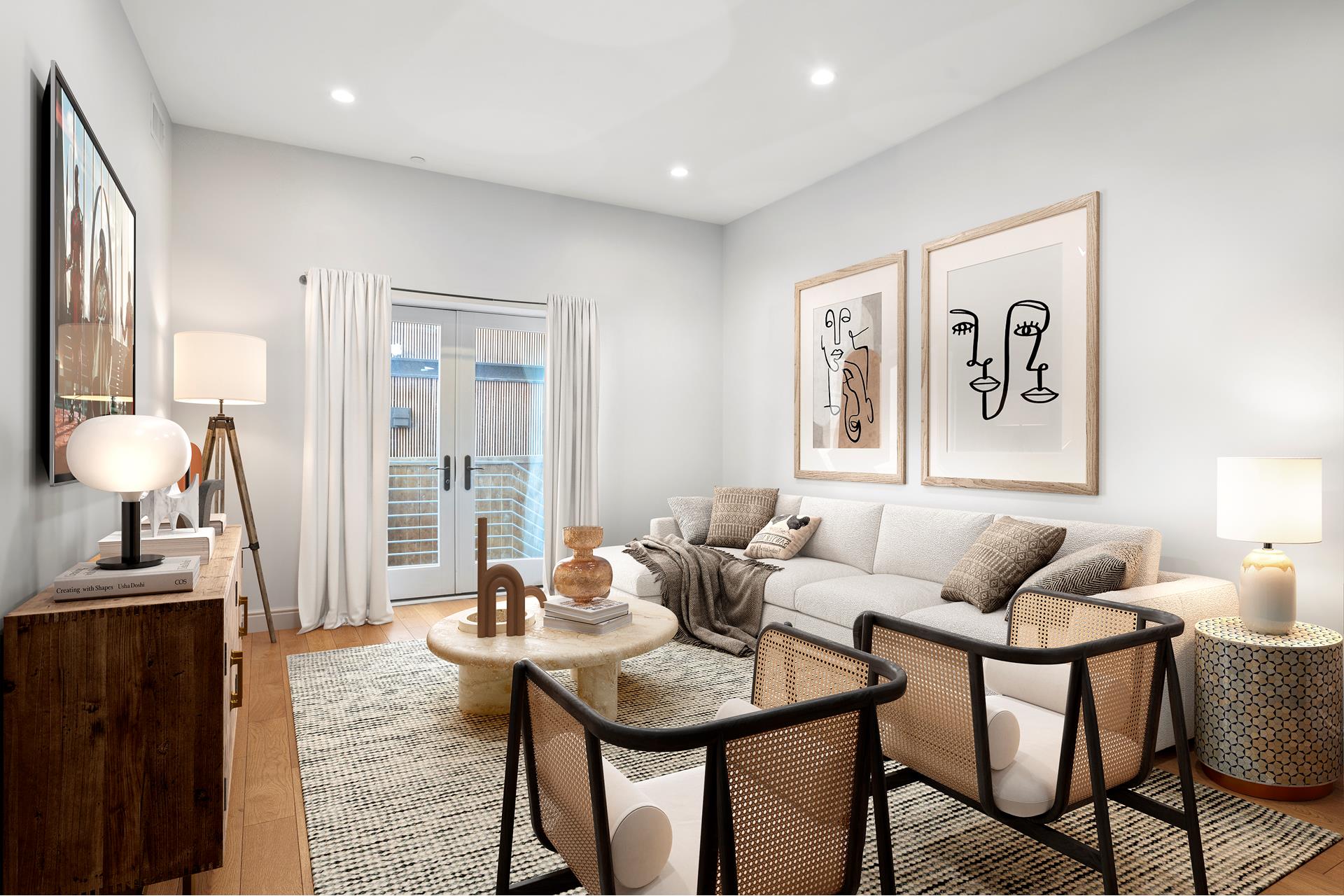 a living room with furniture and wooden floor