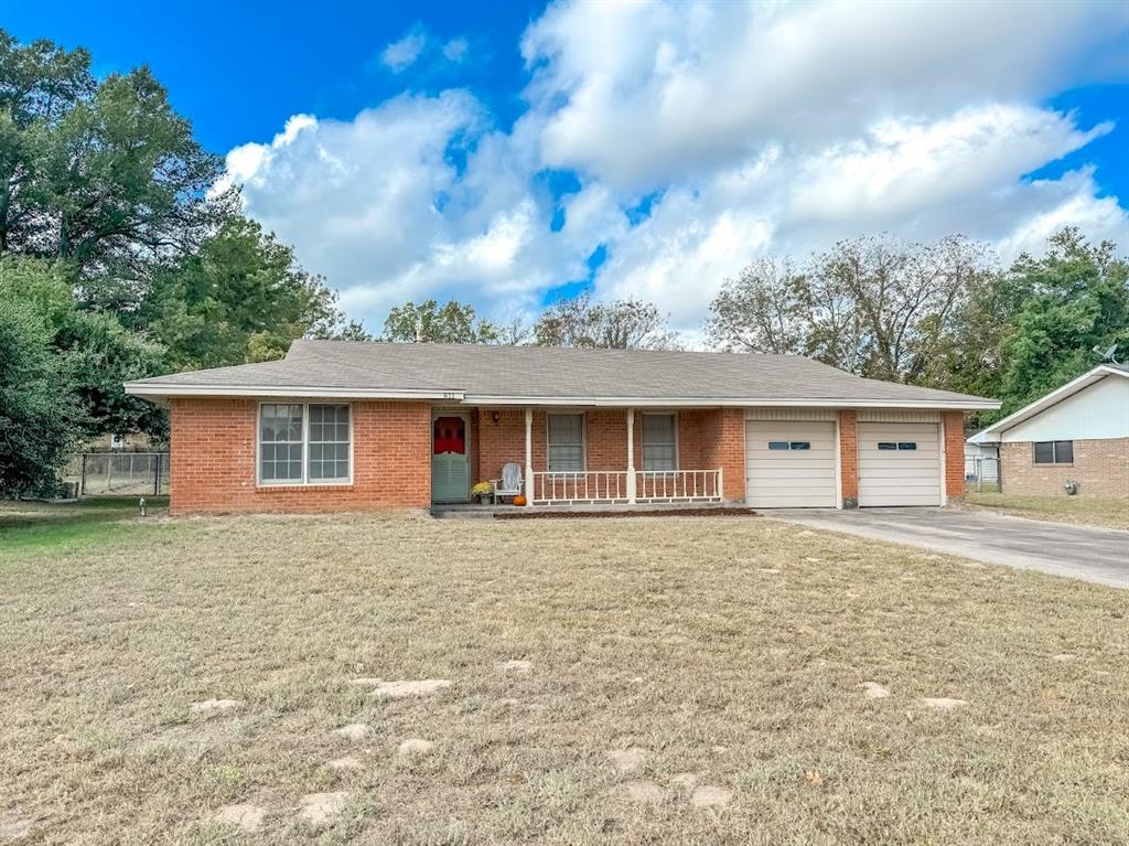 front view of house with a yard