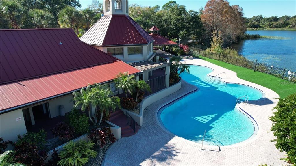 a view of a backyard with sitting area