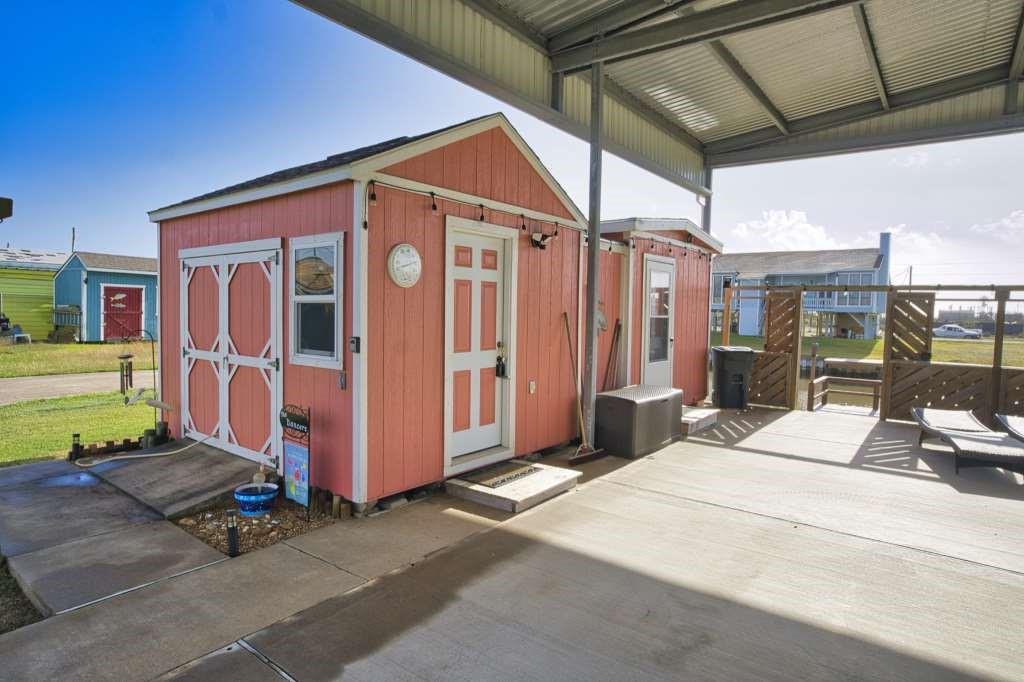 a view of a house with wooden floor and a sink