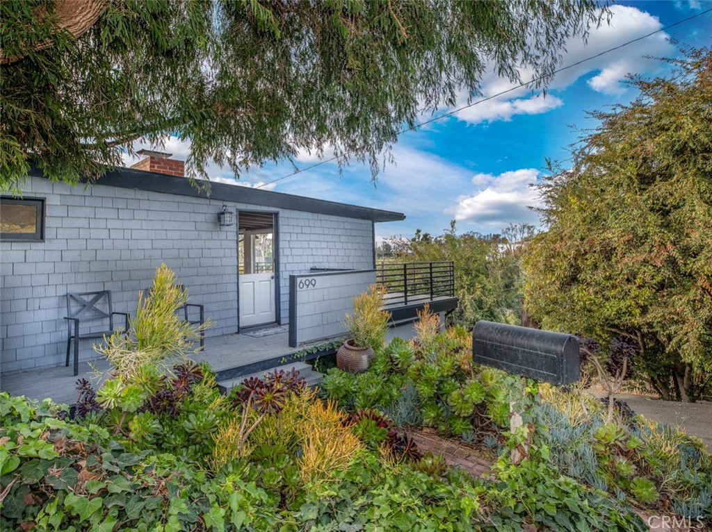 a backyard of a house with lots of green space