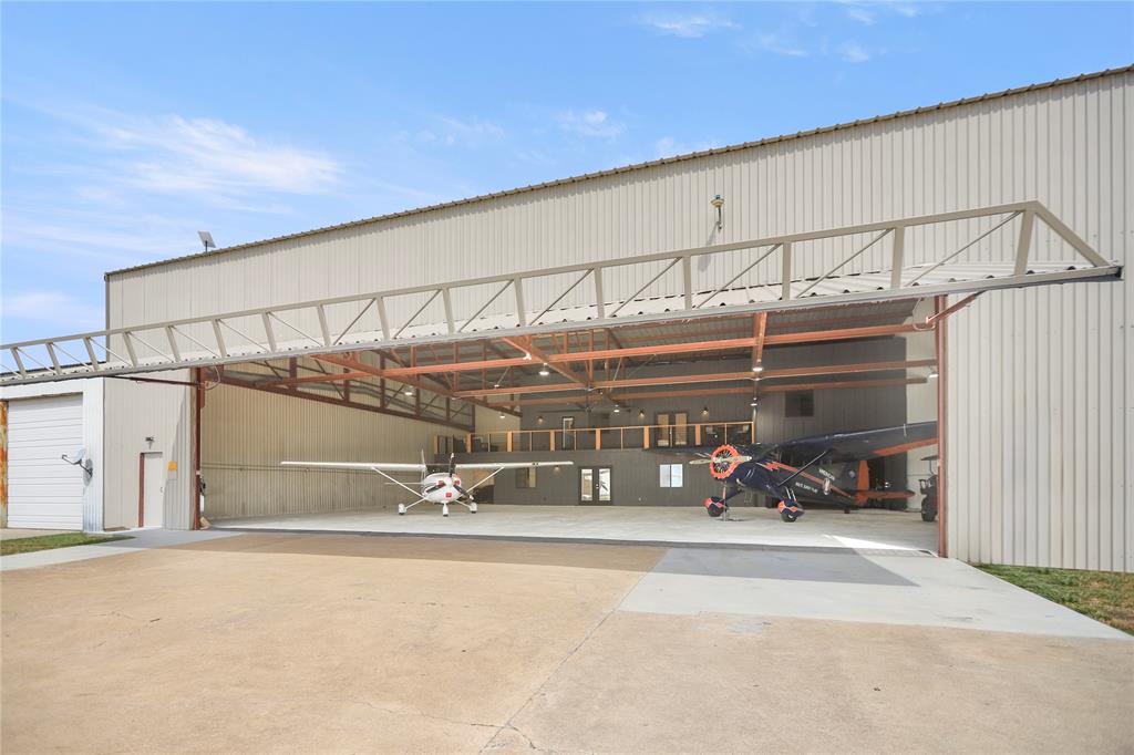 a view of a car garage of the house