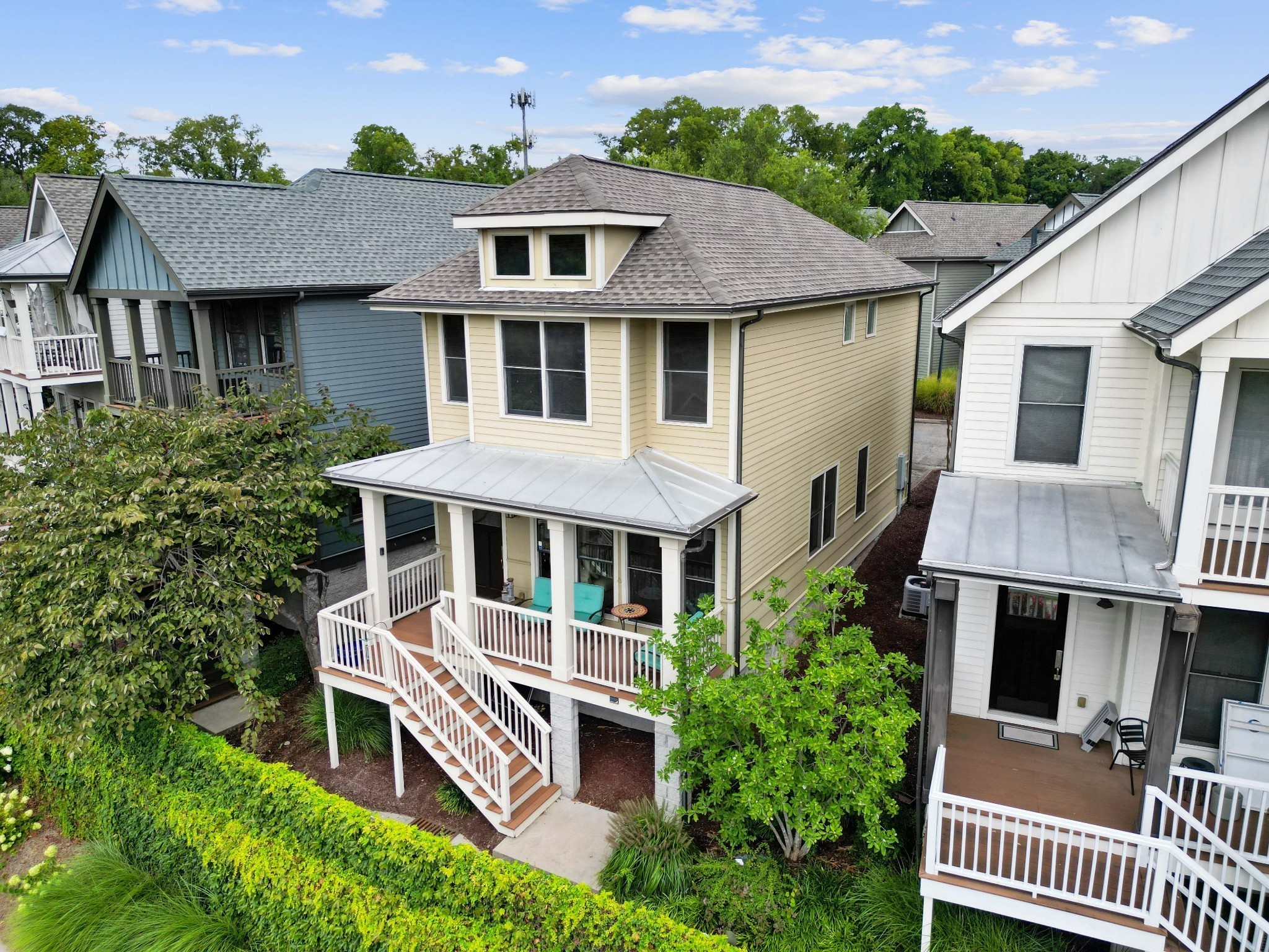 a aerial view of a house with a yard