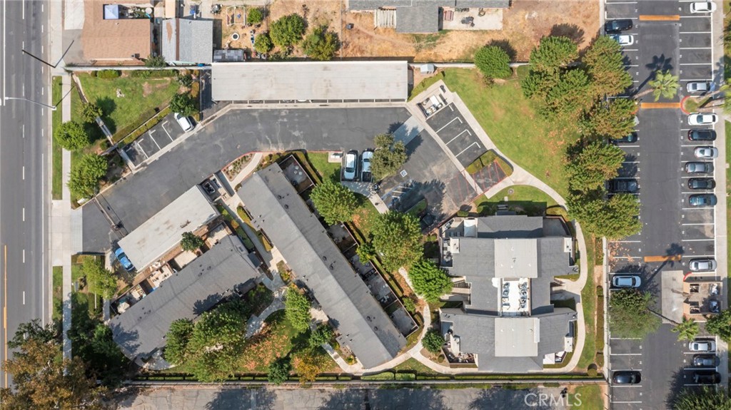 an aerial view of a house with outdoor space