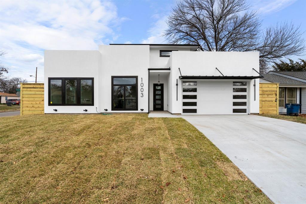 a view of a house with a garage