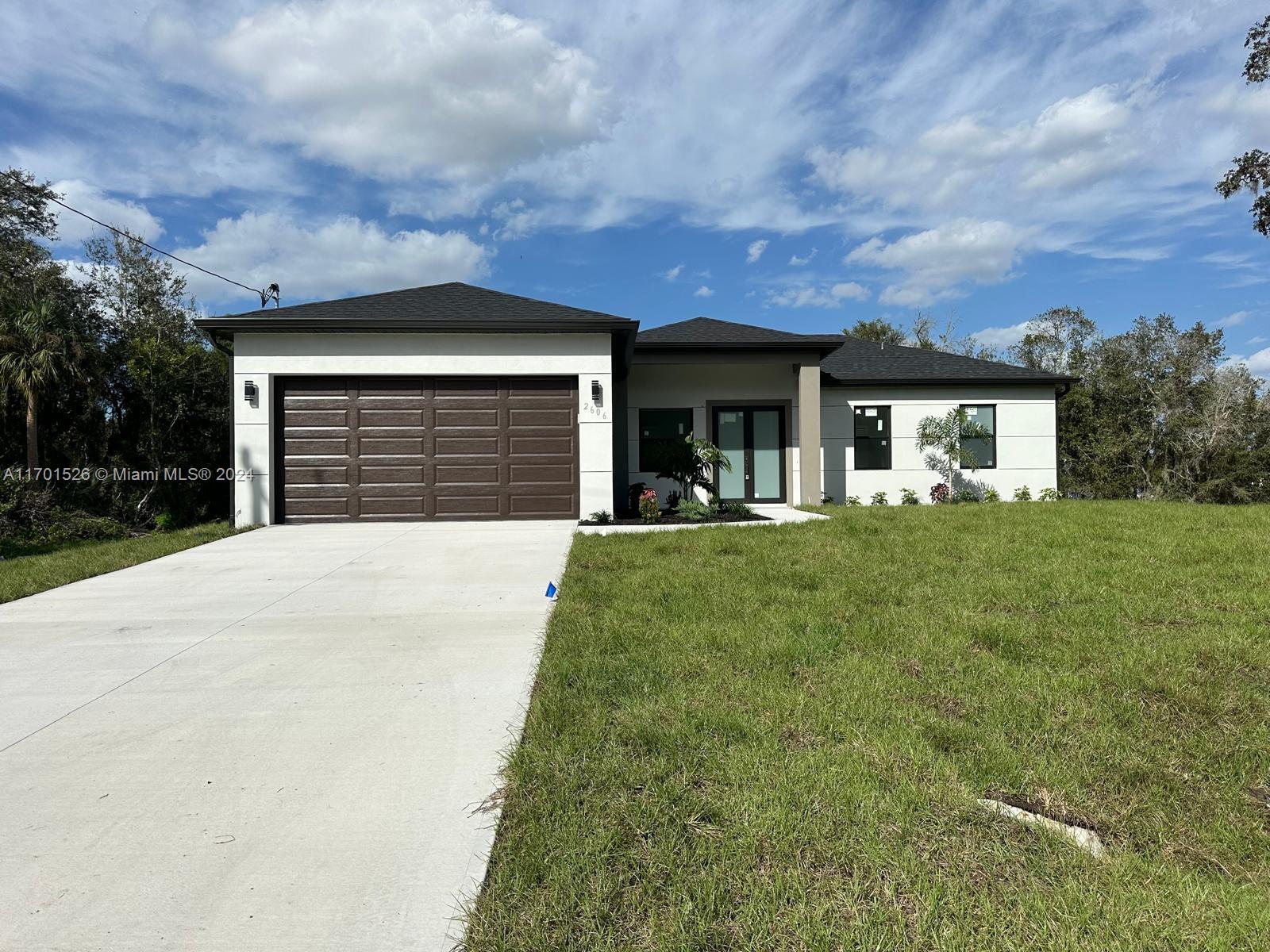 a front view of house with yard