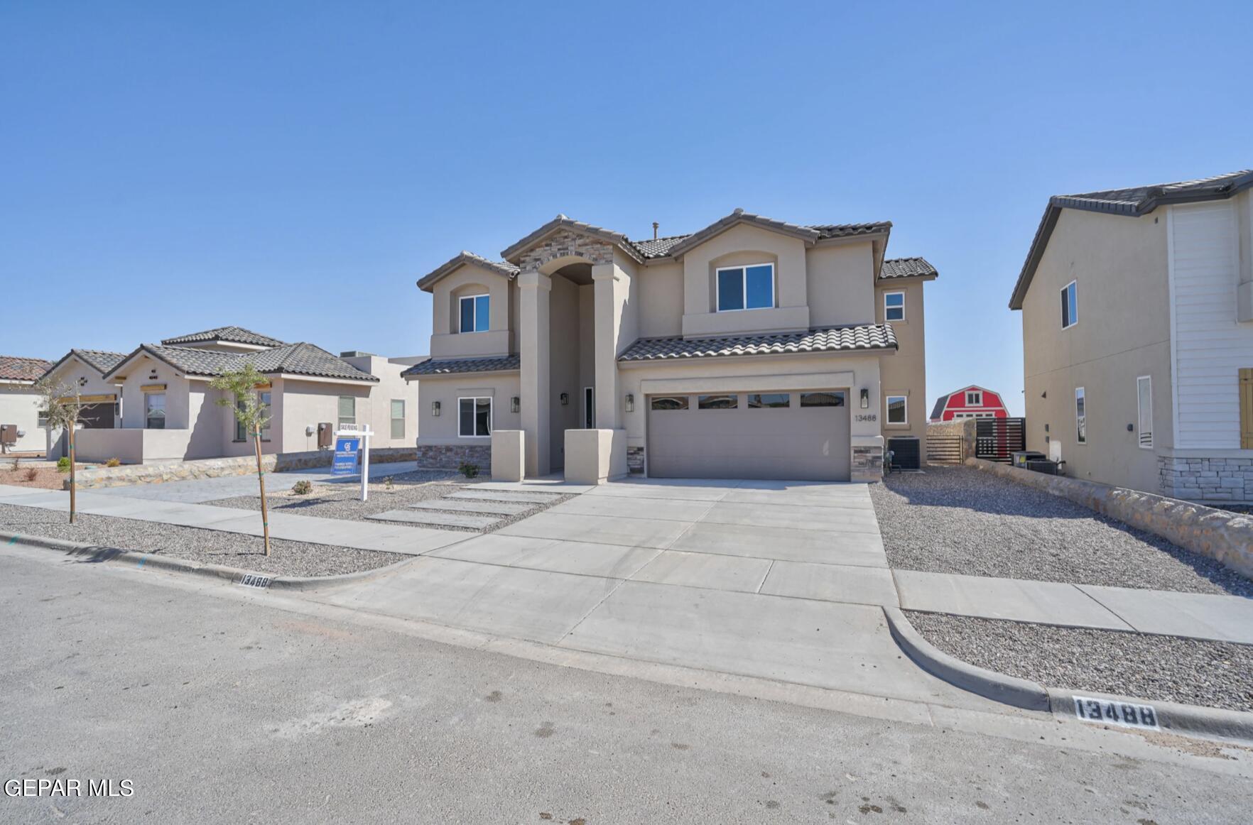 a front view of a house with a entertaining space