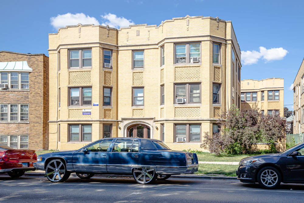 a car parked in front of a house