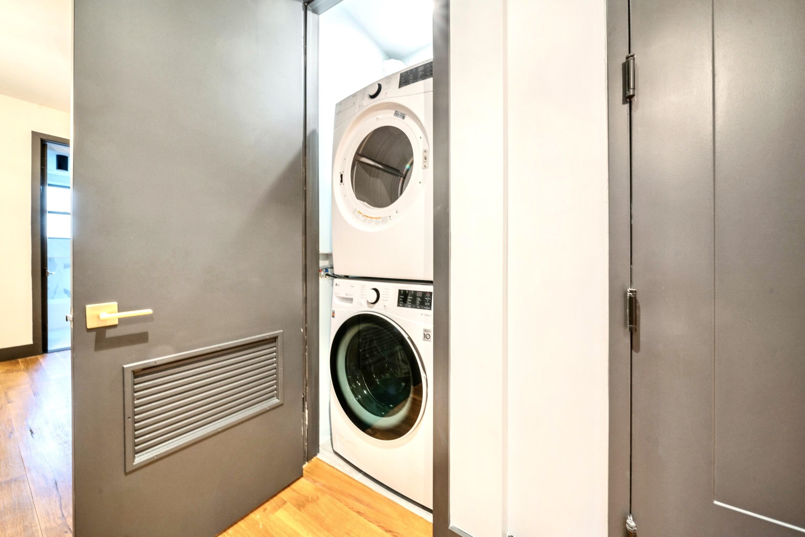 a utility room with dryer and washer