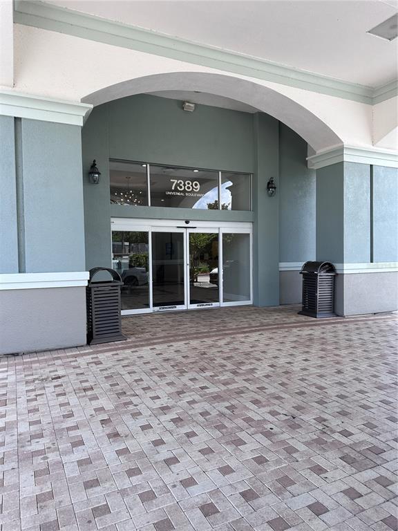 a view of a entryway door front of a house