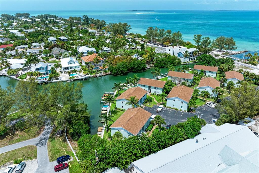 an aerial view of a houses with outdoor space