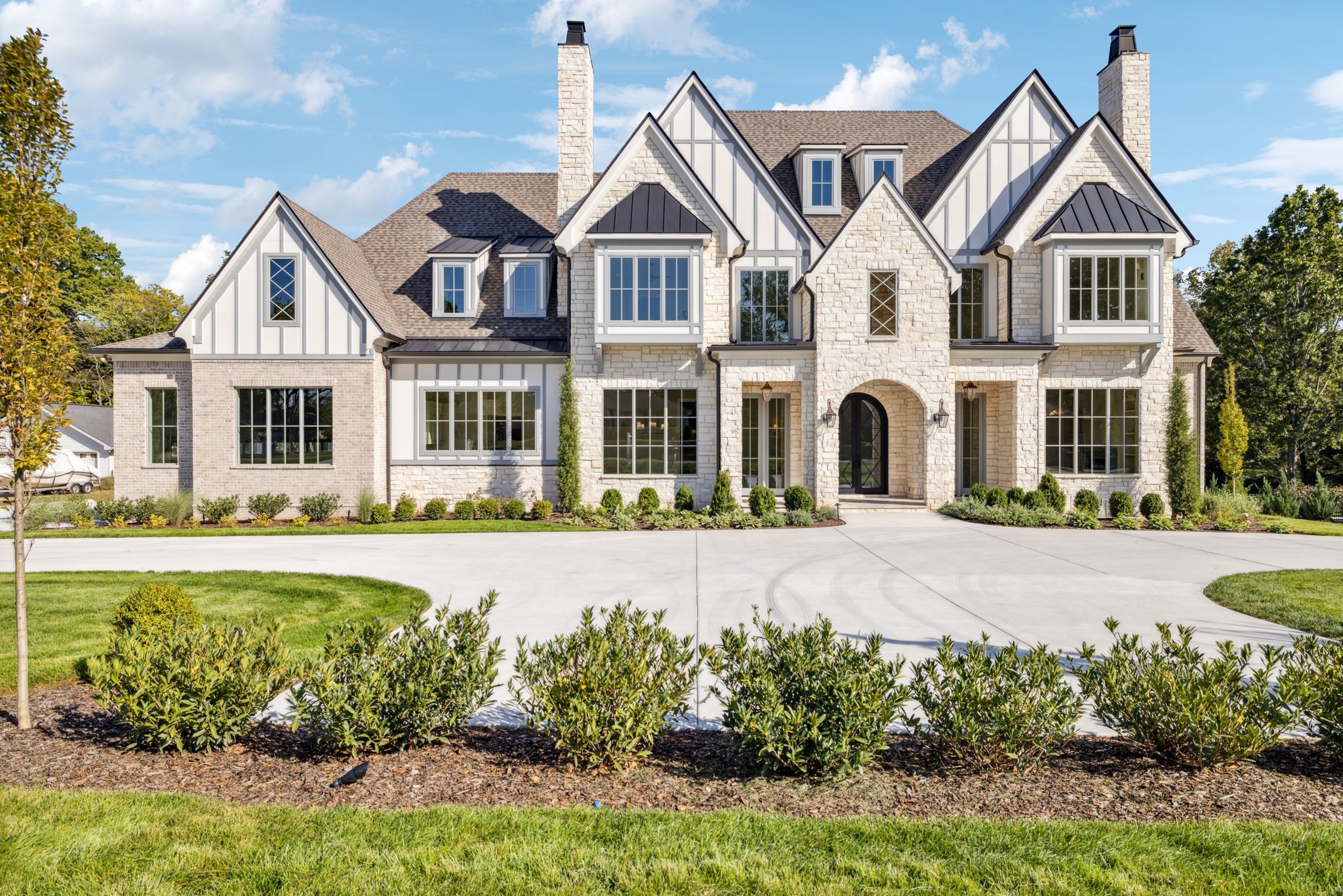 front view of a house with a yard