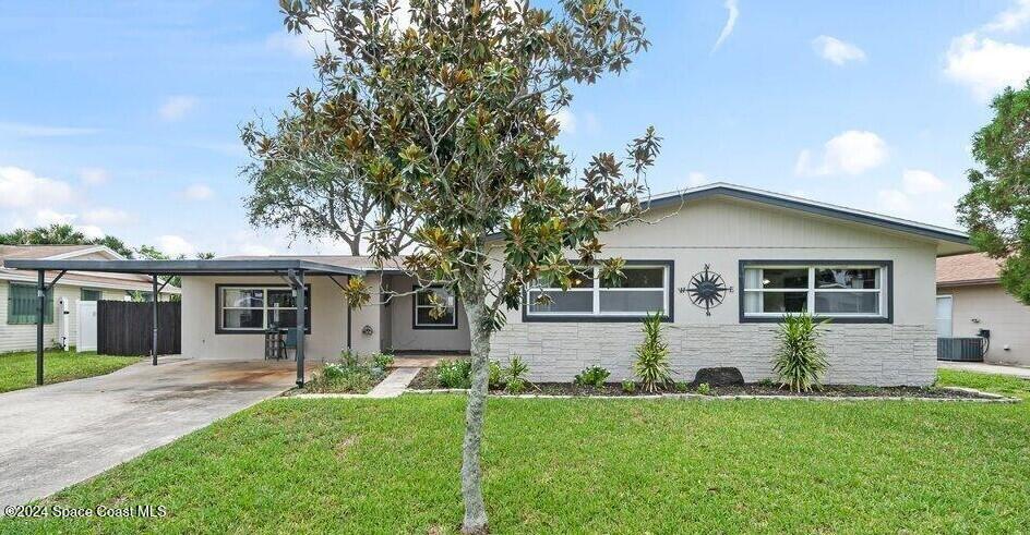 front view of a house and a yard