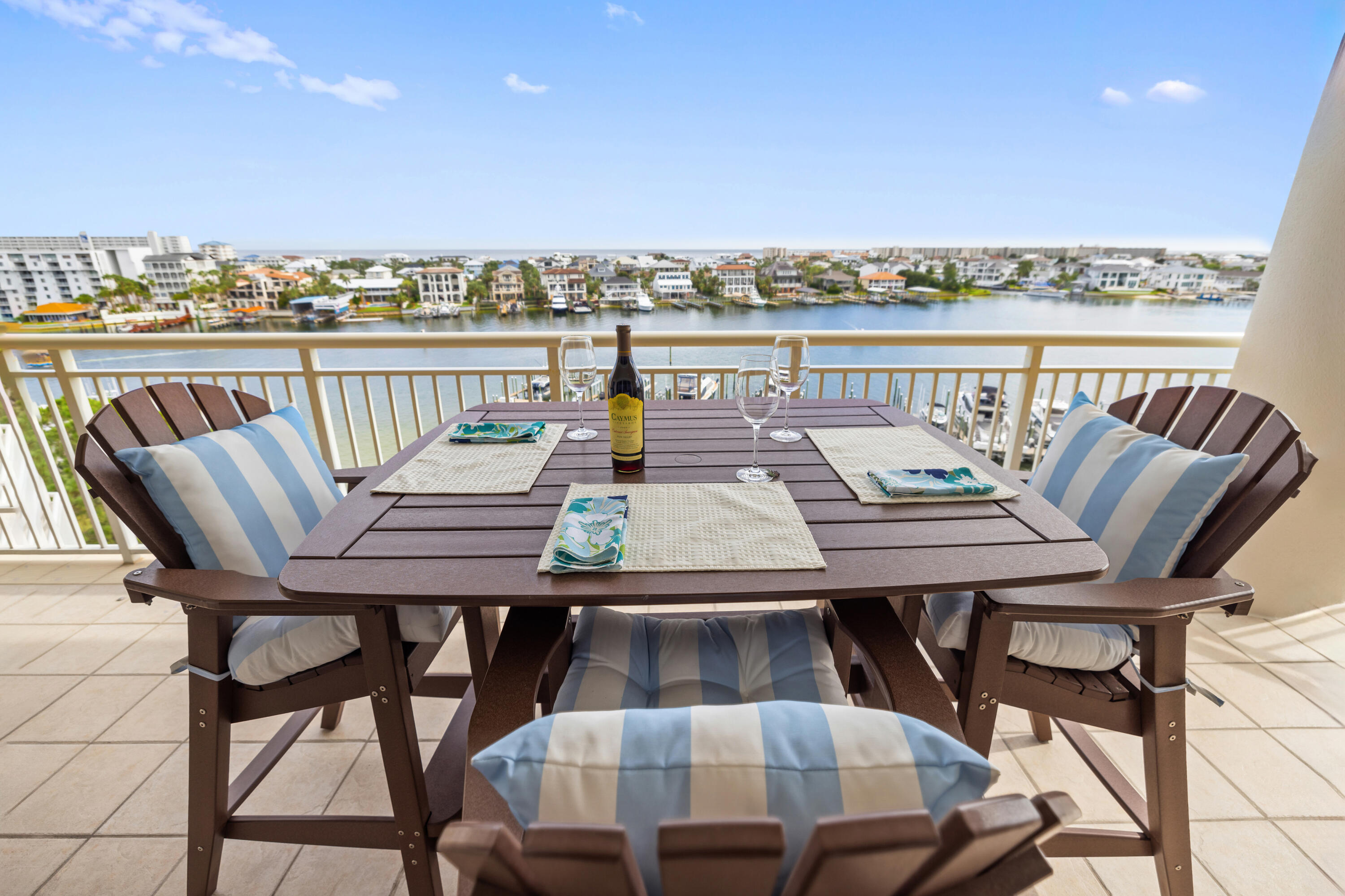 a view of a balcony with furniture