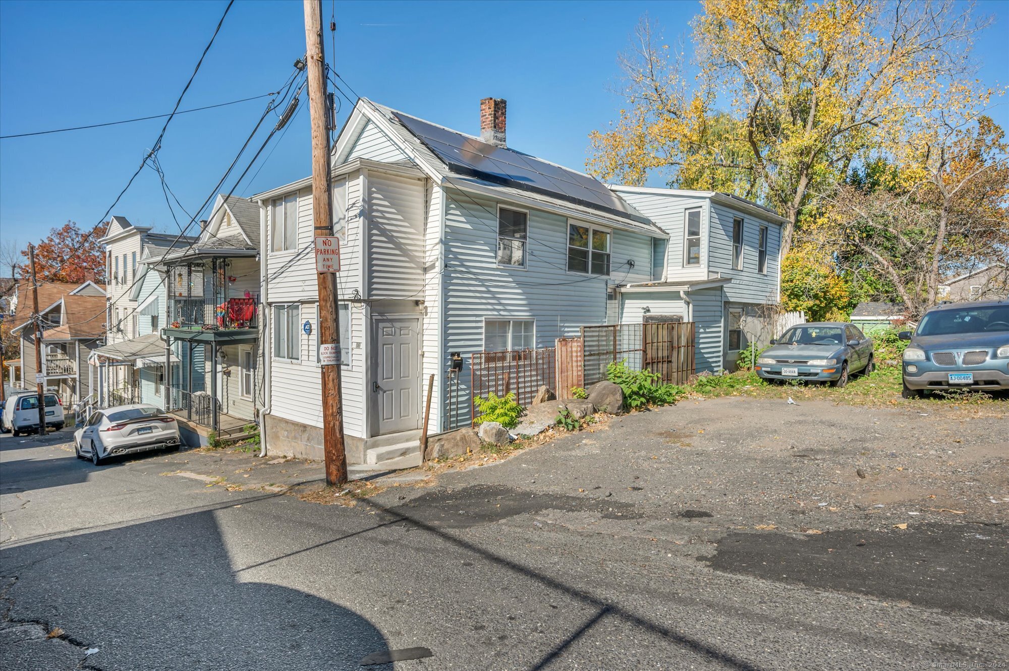 a car parked in front of a house