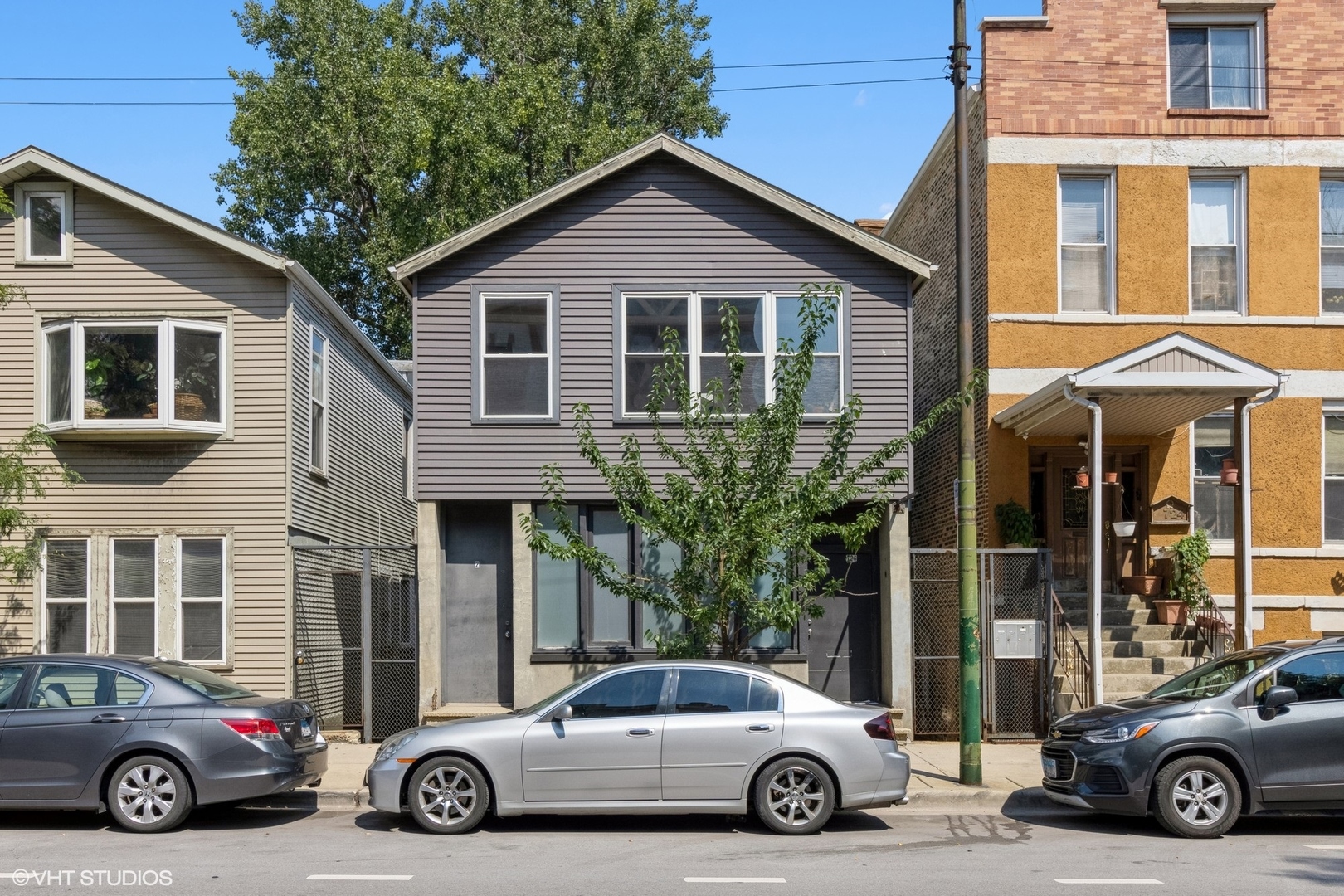 a car parked in front of a house