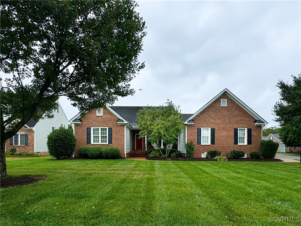 View of front of home. Brick!