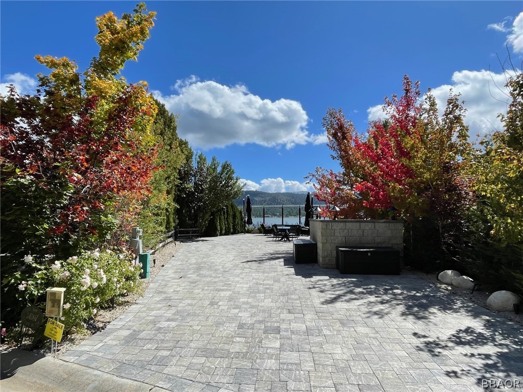 a view of a backyard of the house