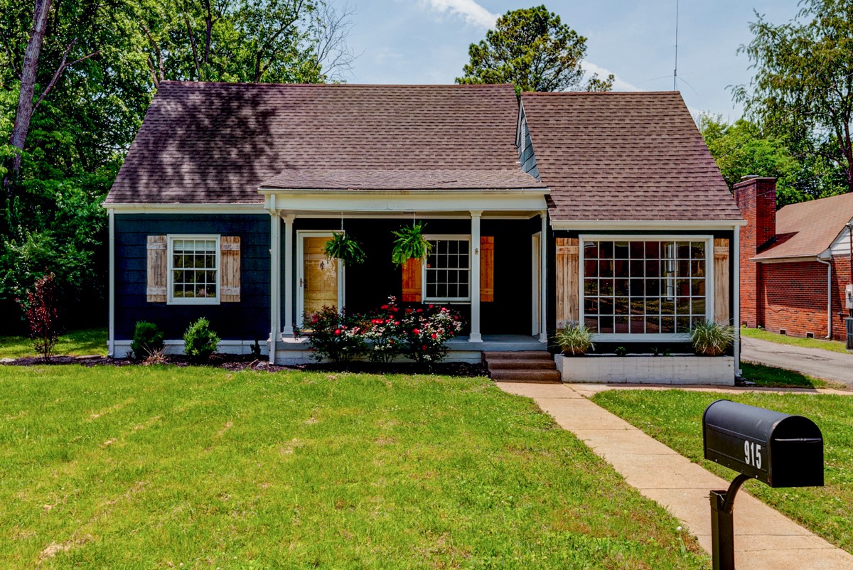 front view of a house with a yard