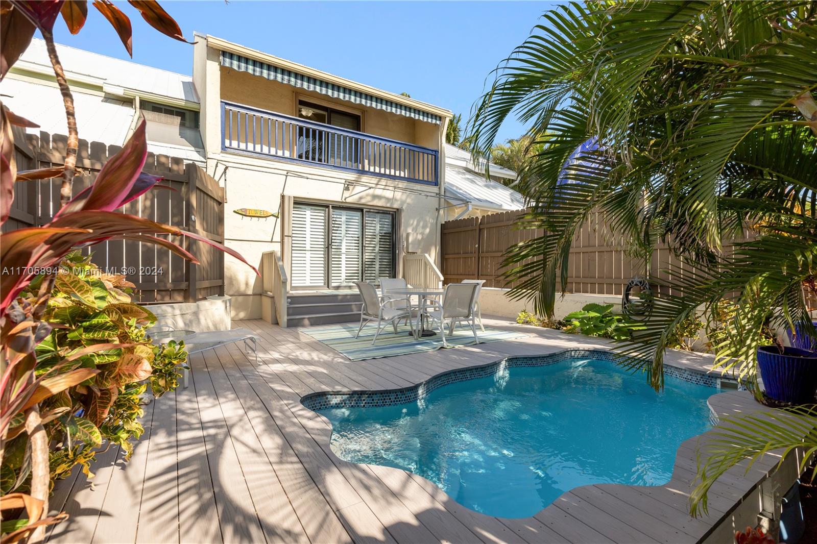 a view of yard with swimming pool