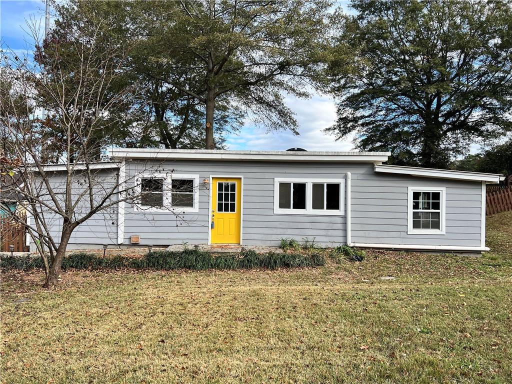 a front view of house with yard