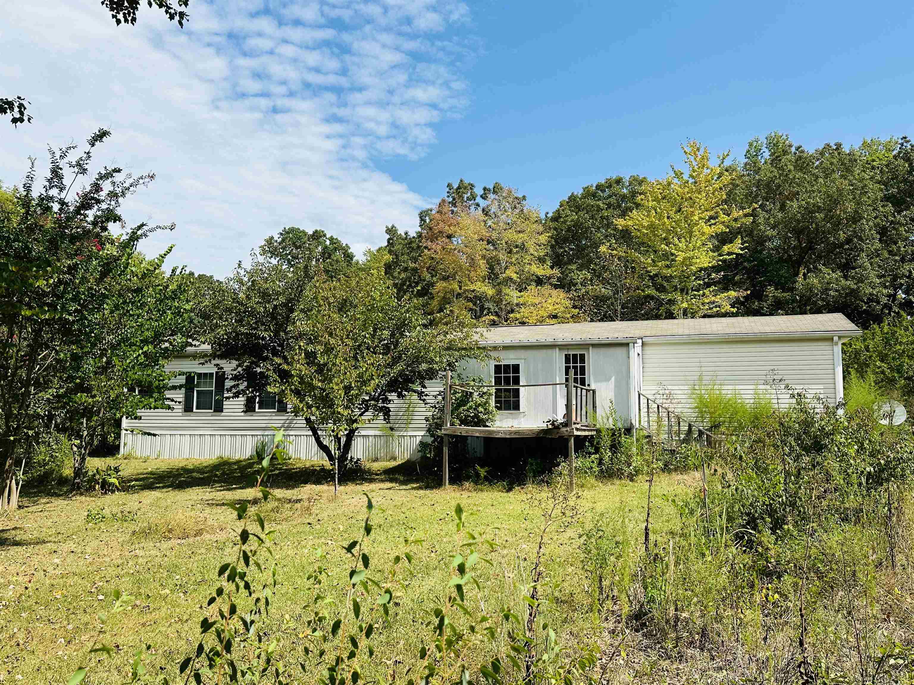 Exterior space with a front yard