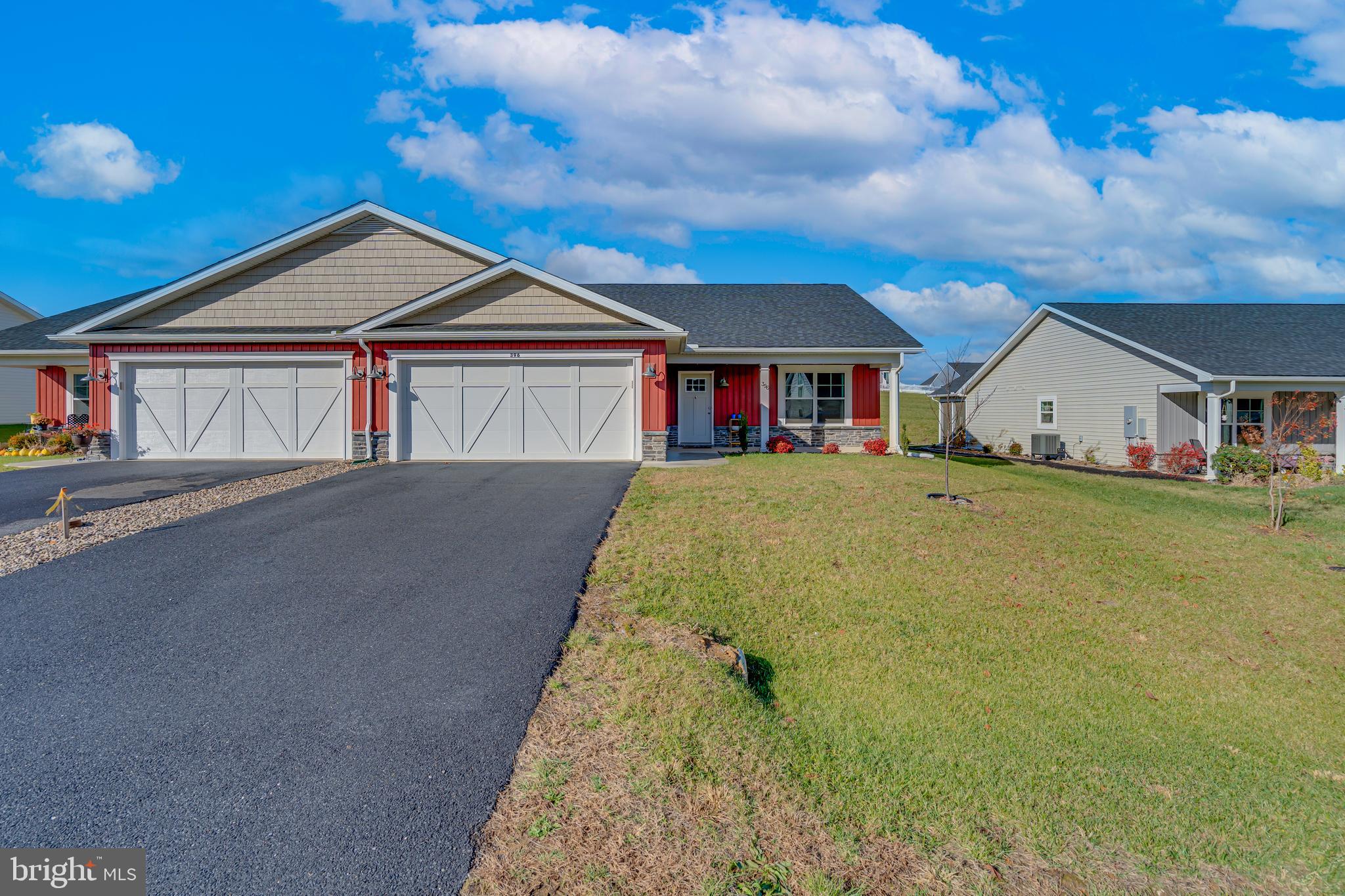 a view of house with yard and entertaining space