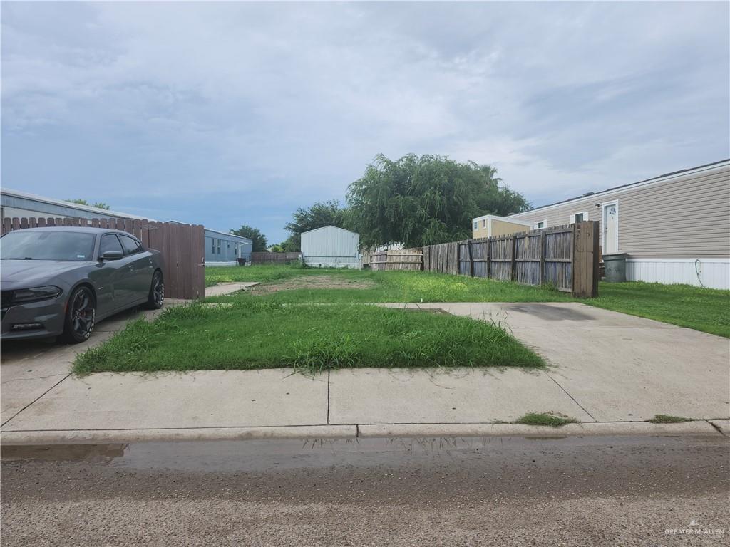 a view of a house with a street