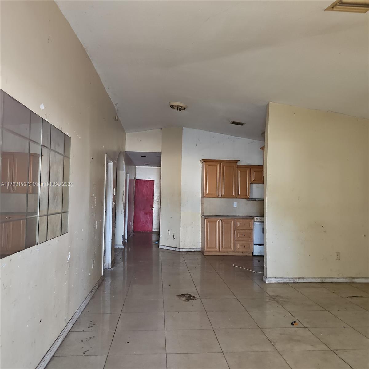 a view of an empty room and window