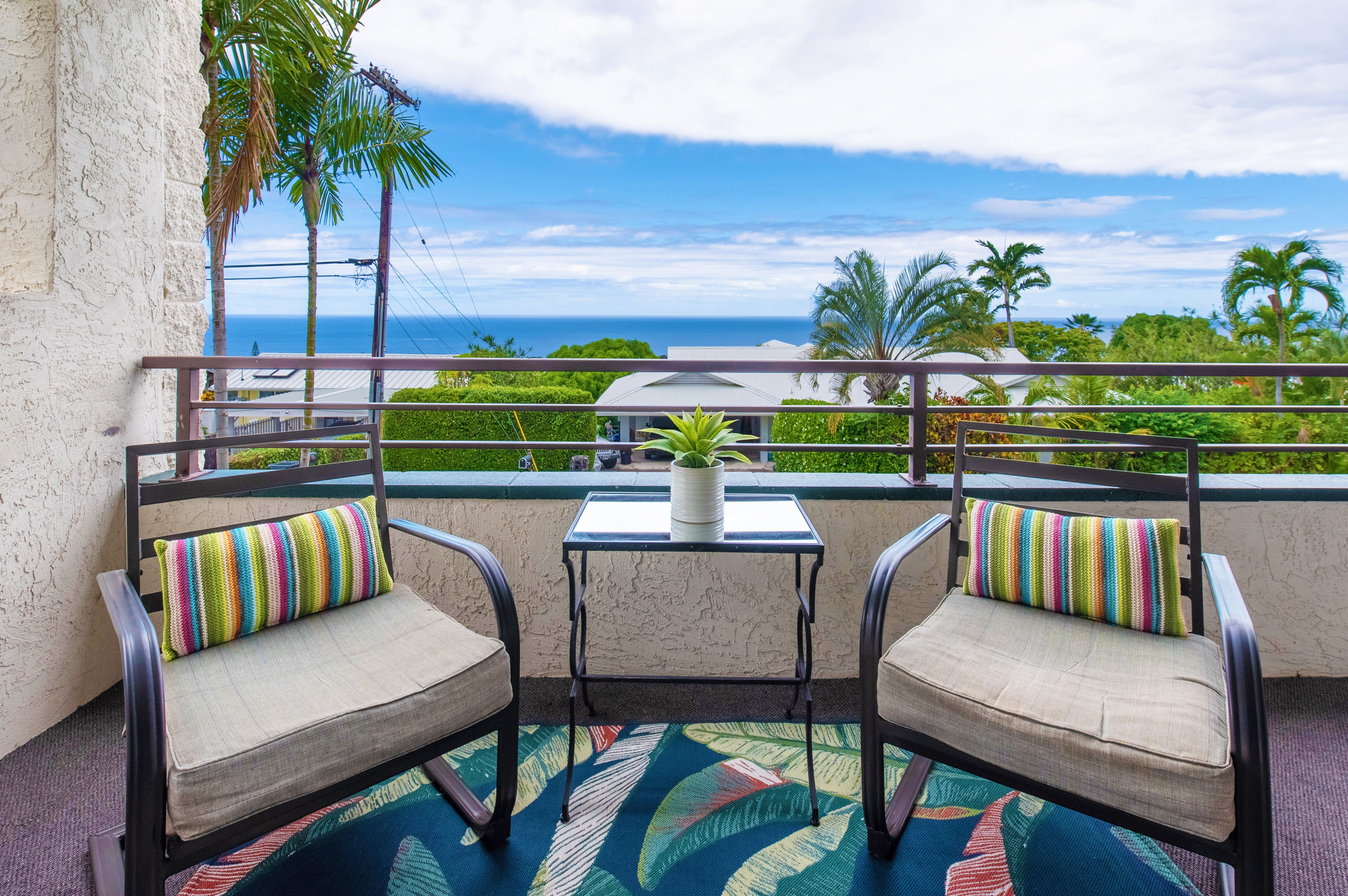 a view of a chairs and table in patio