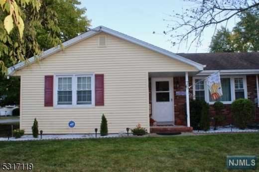 a front view of house with yard