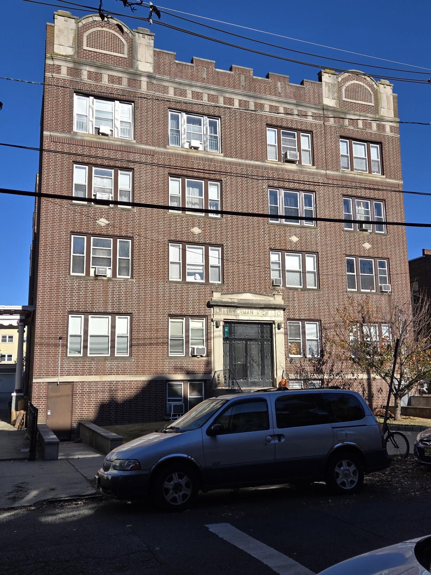 a car parked in front of a building