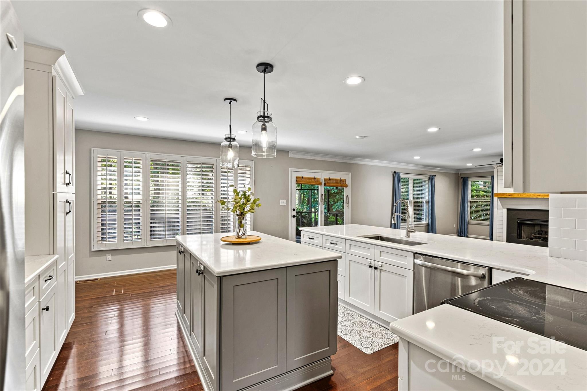 a very nice looking dining room with a large window