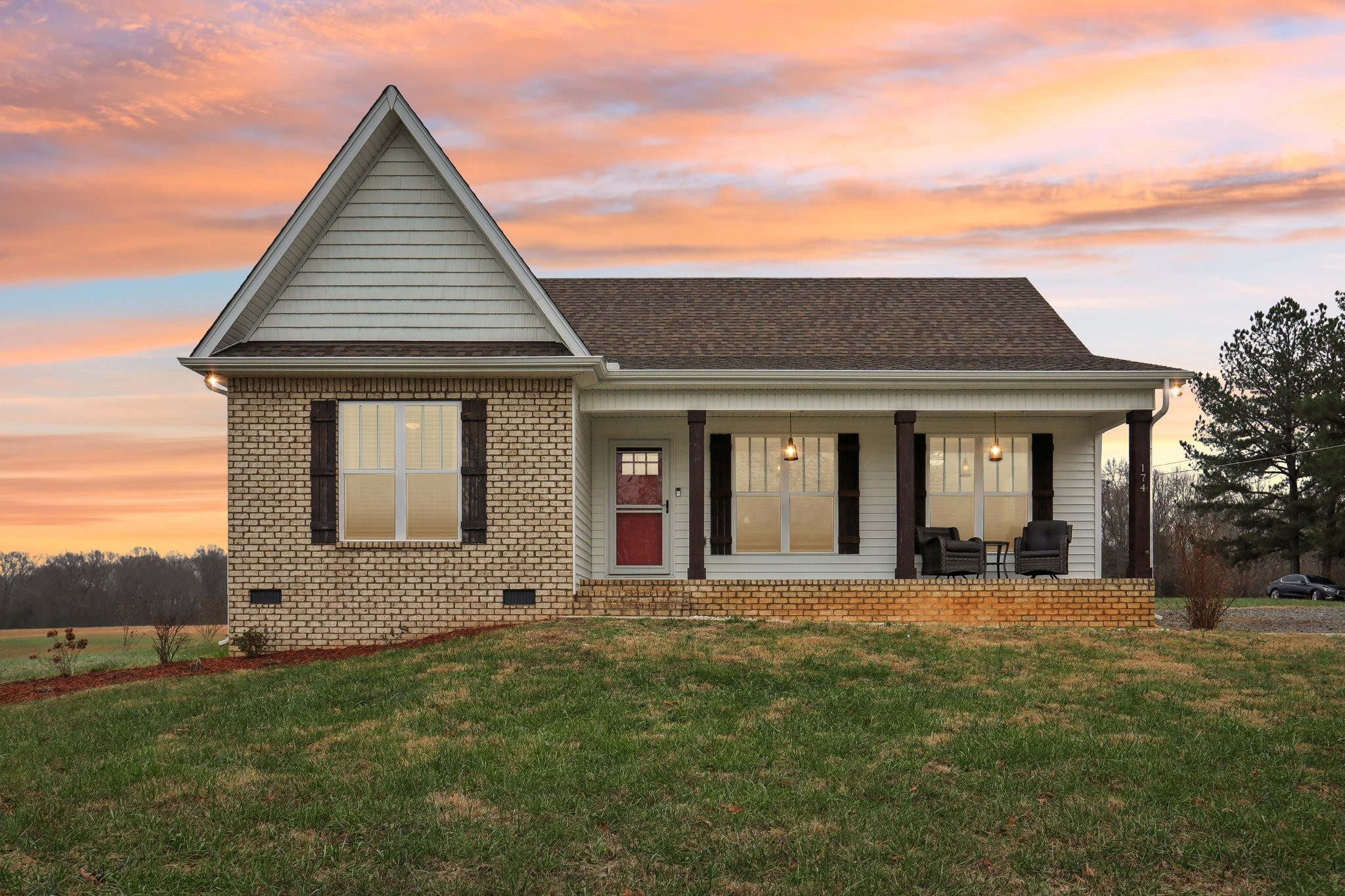 a front view of a house with a yard