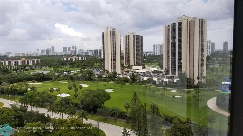 a view of a city with tall buildings