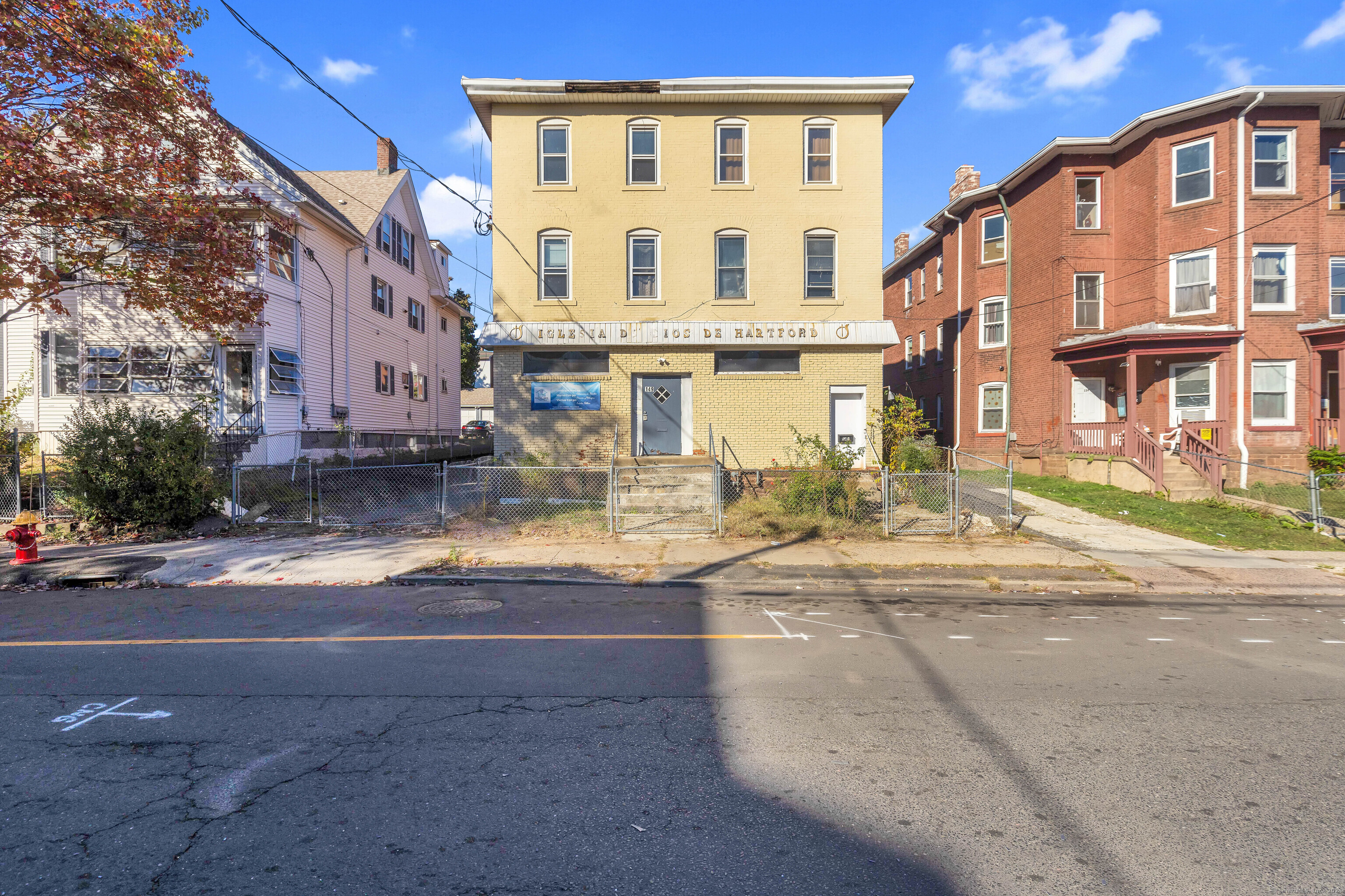 a view of a building with a street