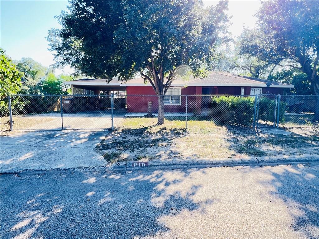 a house with trees in front of it