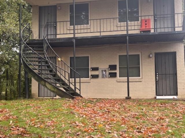 a front view of a house with a stairs