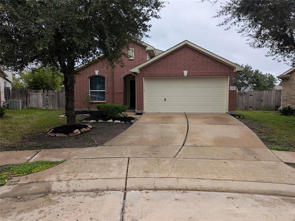 a front view of a house with yard