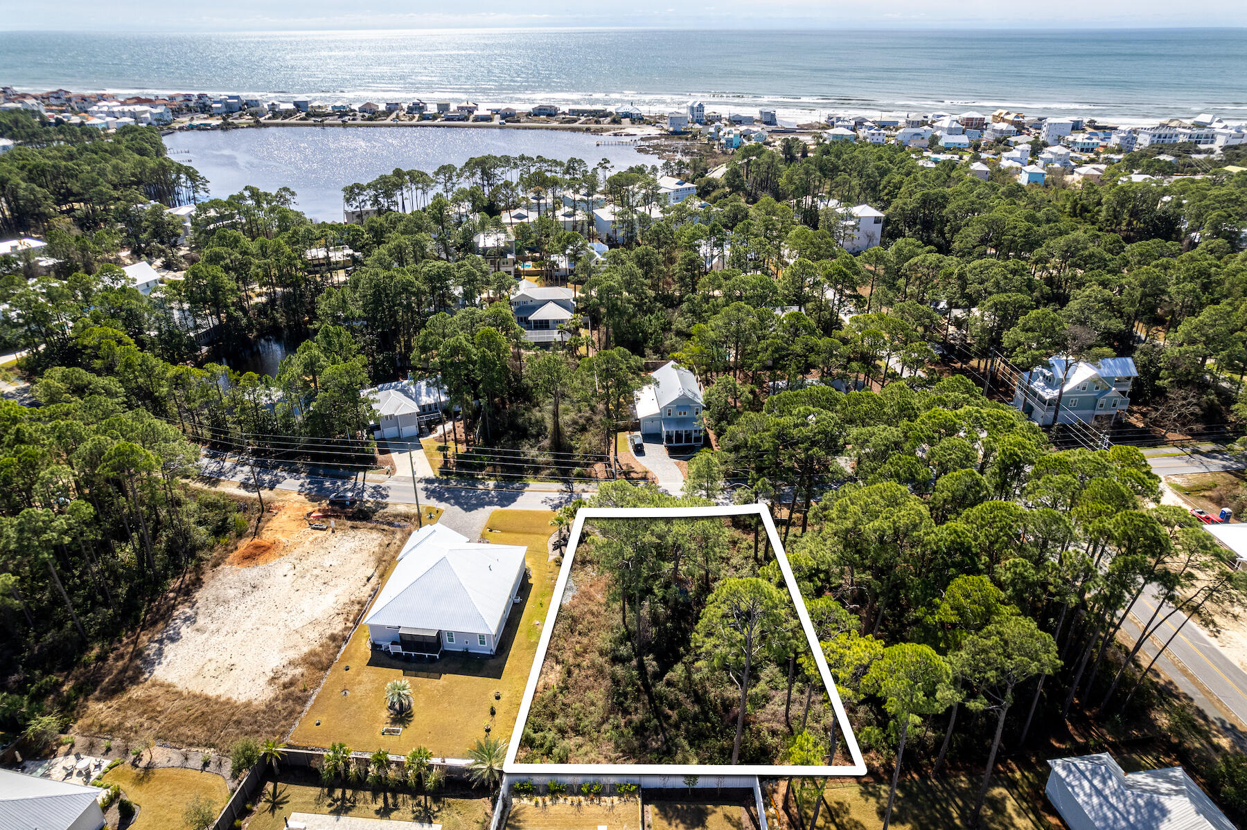 an aerial view of a house with a garden