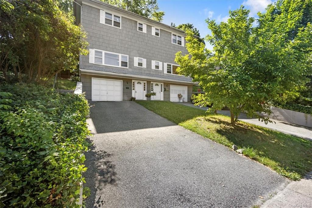 Welcome to this multi-level attached single family home in the heart of the Village of Croton-on-Hudson!