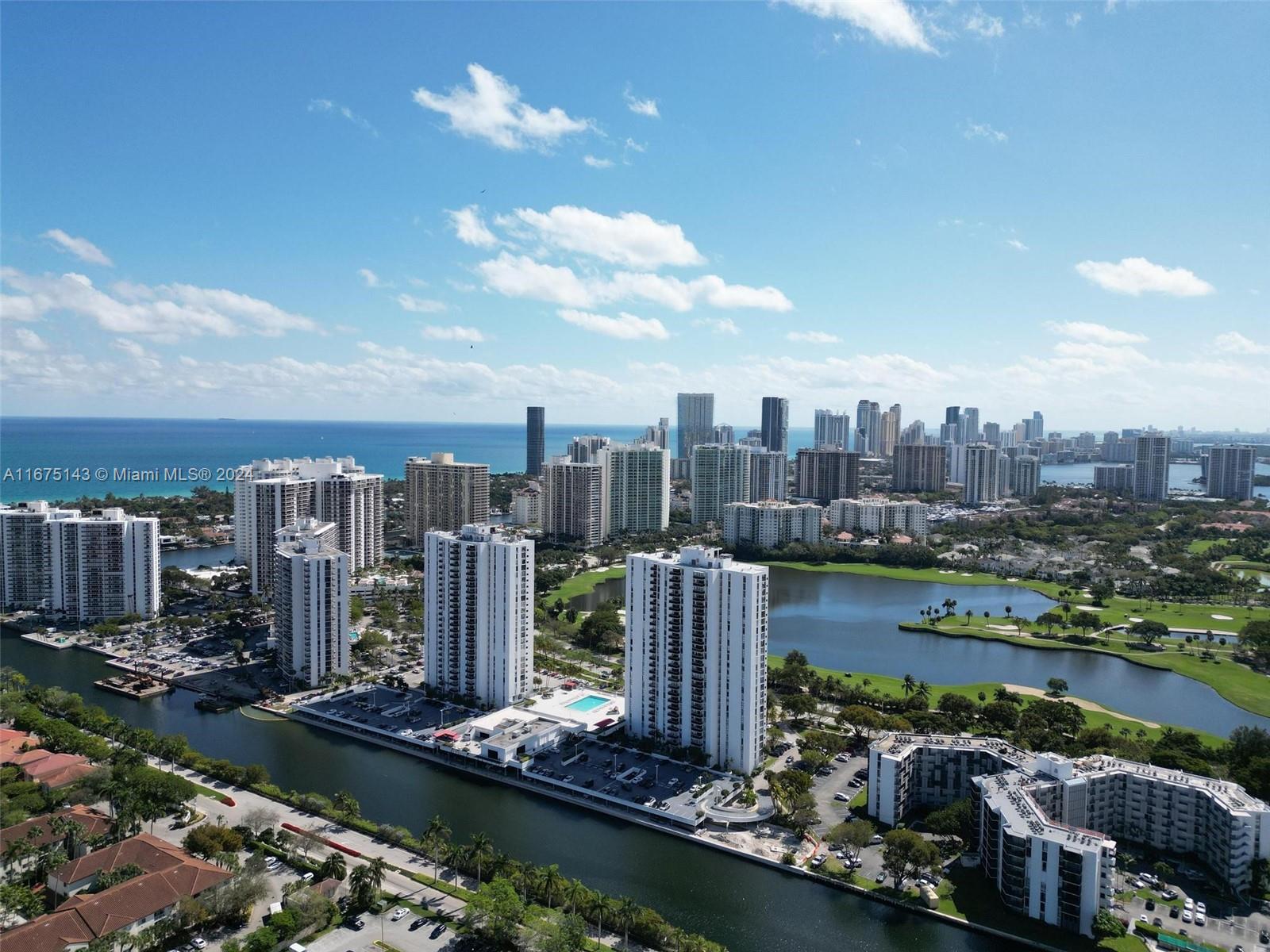 a view of a city with tall buildings