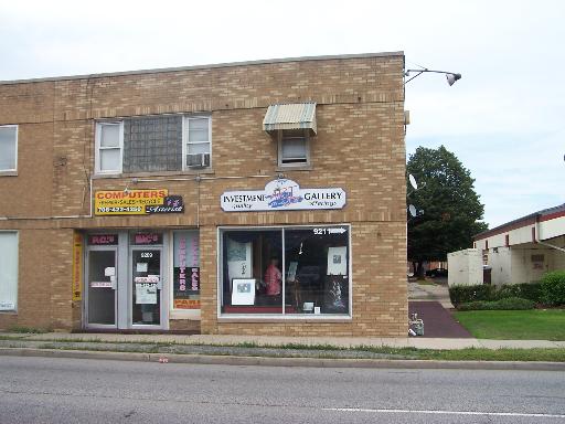 a view of brick building with a entrance