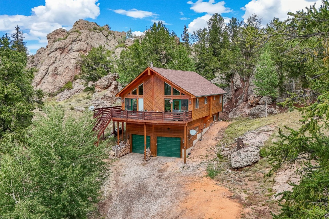 a house with trees in the background