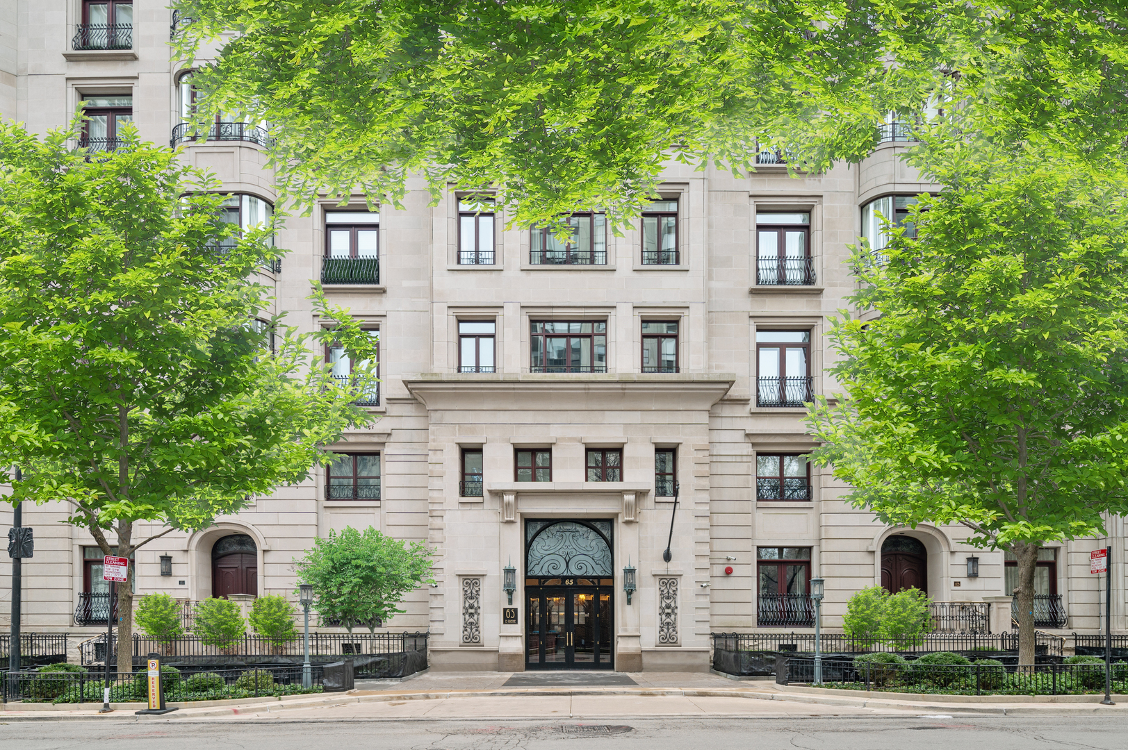 a front view of a building with garden