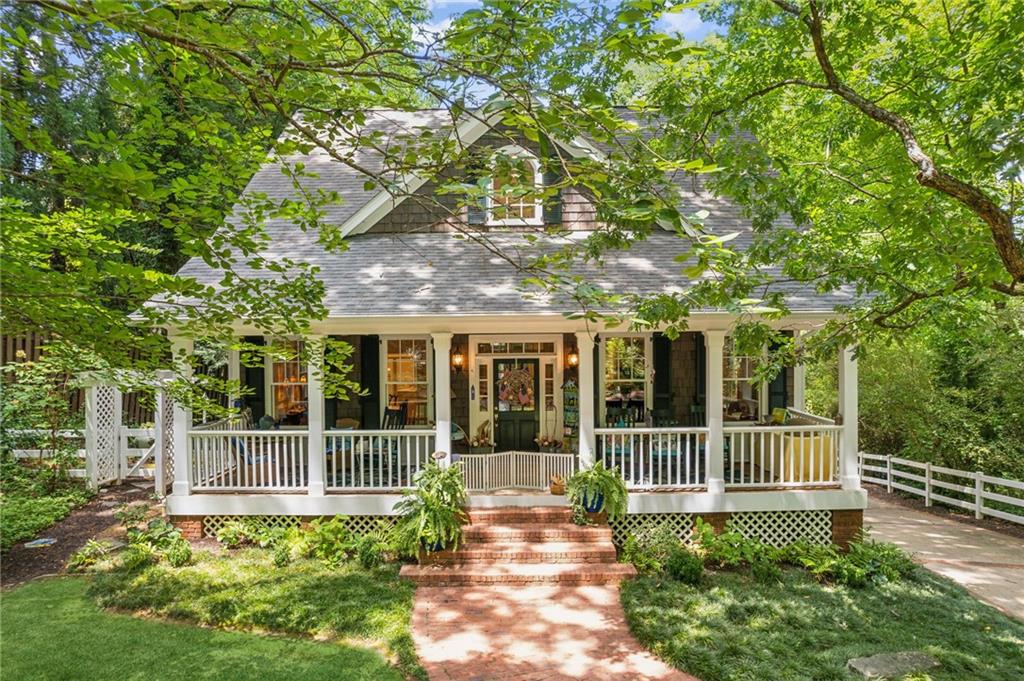 front view of a house with a small yard